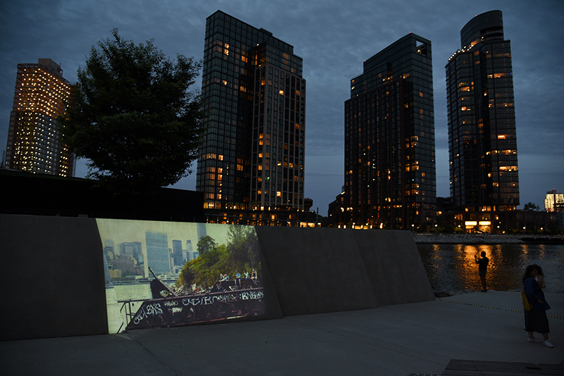 Video projection under residential buildings in Long Island City