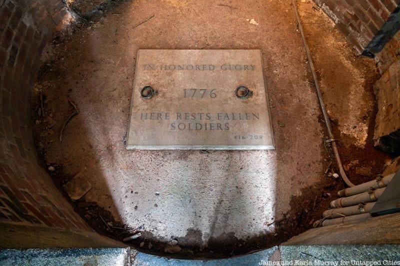 A plaque honoring the memory of lost prisoners of war inside the Prison Ship Martyr's Monument