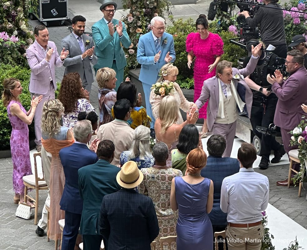 Oliver and Loretta happily walking down the aisle