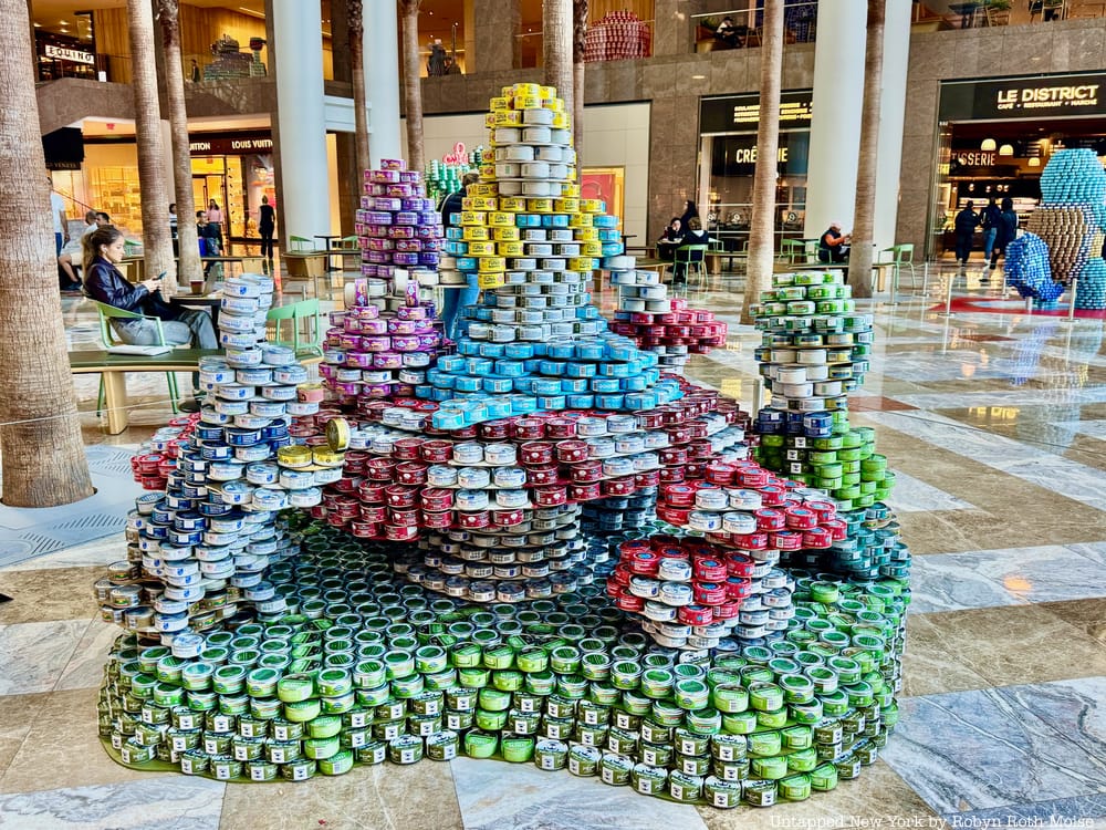 A scene from Alice in Wonderland made out of canned food