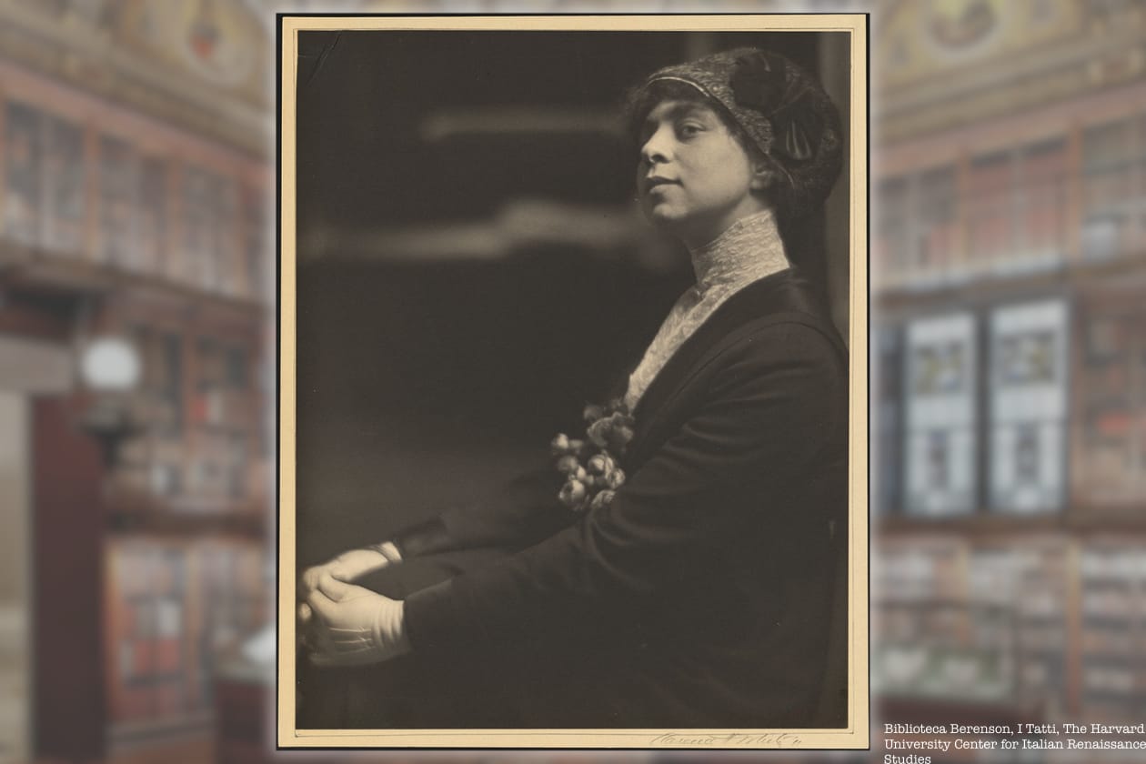 A portrait of Belle de Costa Greene against a blurred background of the Morgan Library