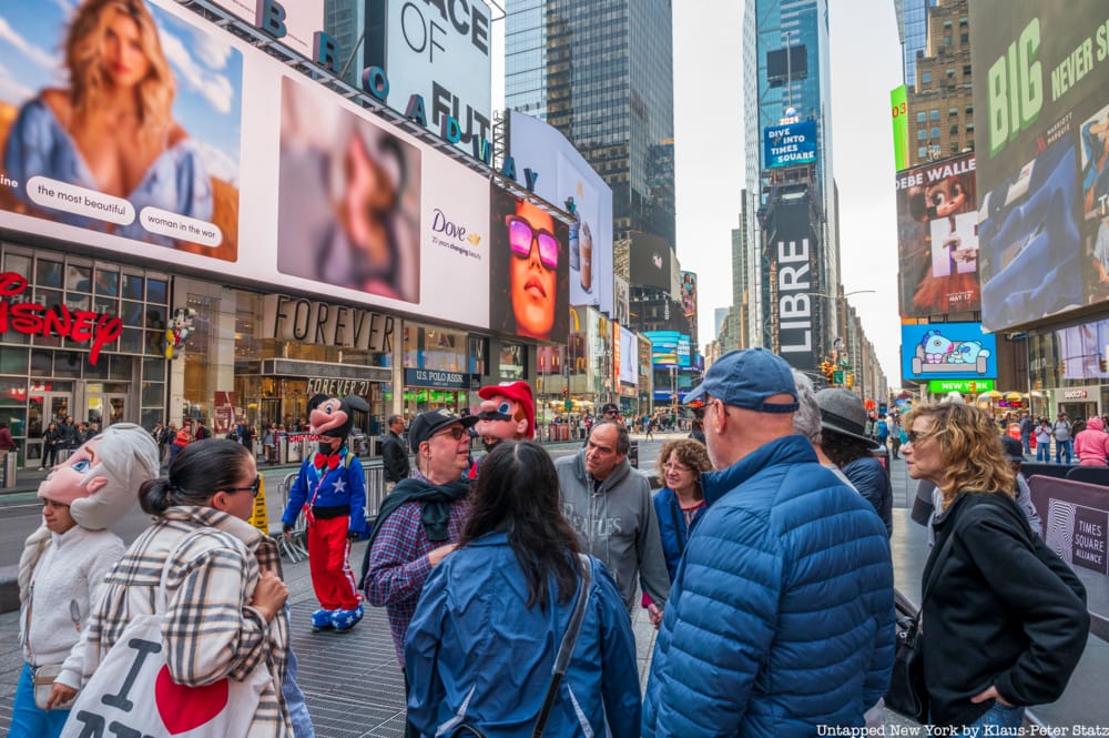 A tour group stands in Times Square