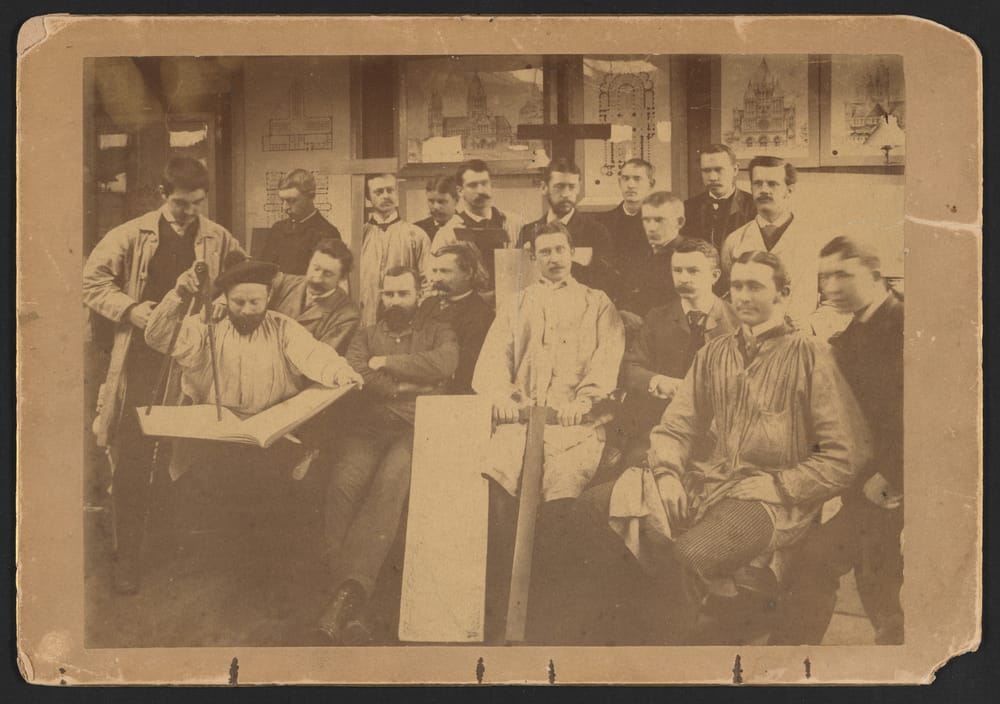 Brookline studio staff, c. 1886, including Robert D. Andrews, William Welles Bosworth, Charles A. Coolidge, Alfred O. Elzner, John Evans, John G. Howard, Alexander W. Longfellow, and Charles H. Rutan.