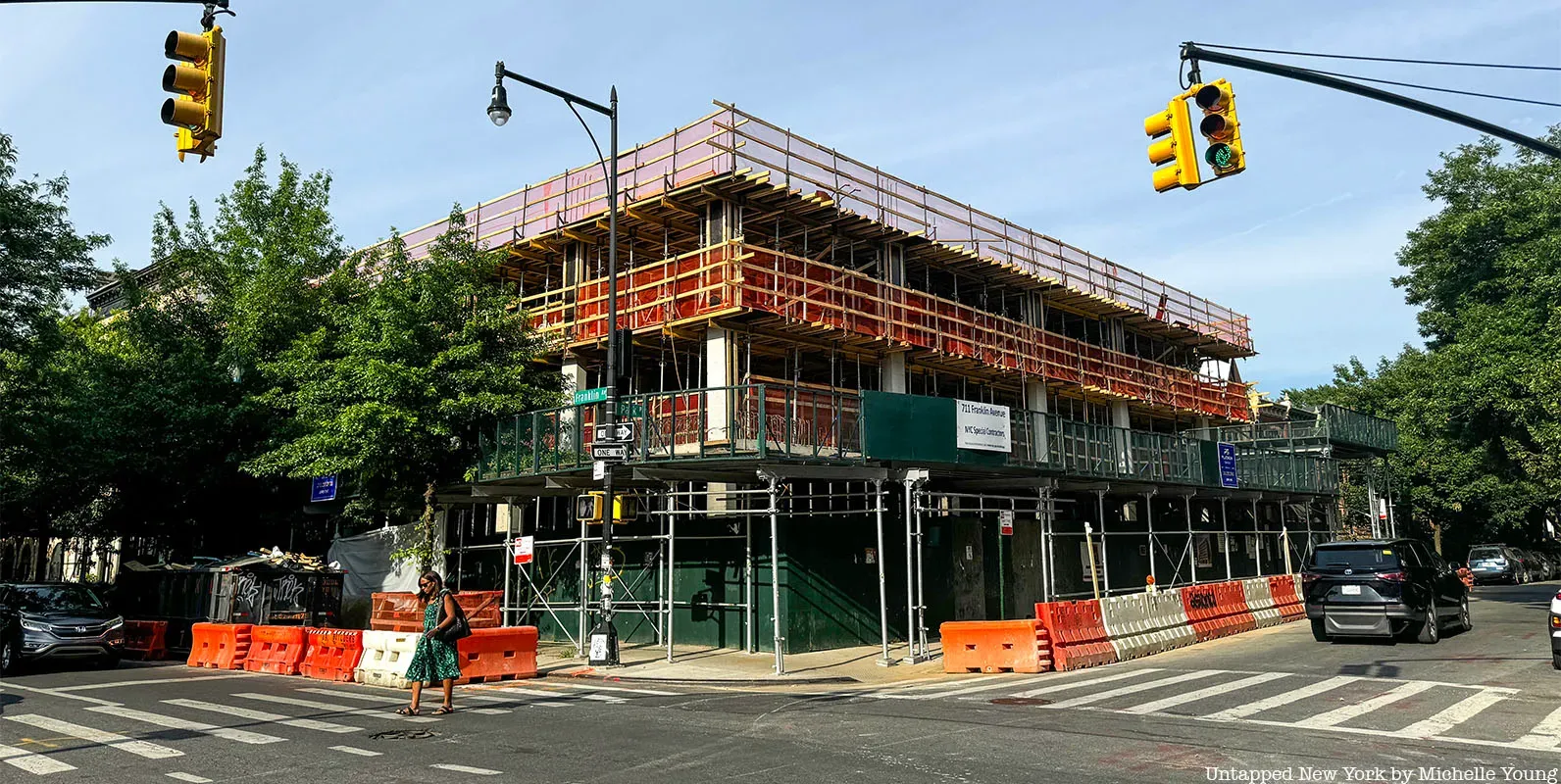 A bulding wrapped in scaffolding