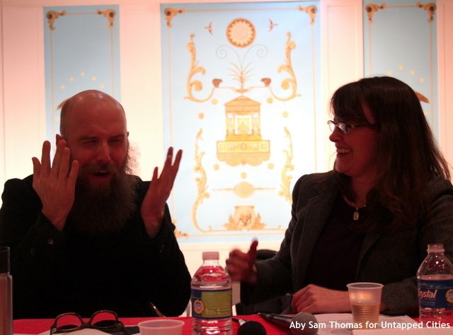 Steve Lambert and Alexix Clements get animated during a break in the debate.