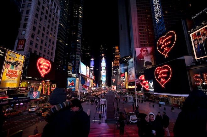 Tracey Emin's piece, "I Promise to Love You," lights up the billboards of Times Square. Photo by Ka-Man Tse.