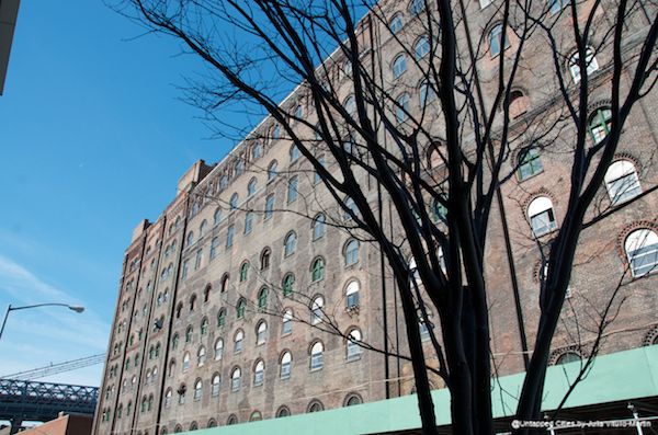 Opened in 1884, the American Refinery Building was designed in the American round-arch style, a variant of the German Rundbogenstil and the Romanesque Revival style, noted the Landmarks Preservation Commission in their 2007 designation.