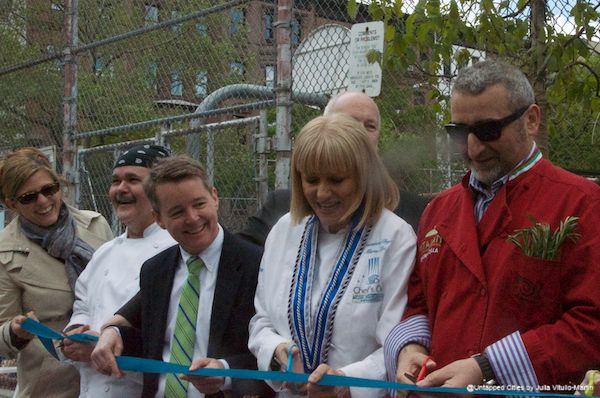 Chefs cutting the ribbon for Columbus Avenue Beautification. From left: Bobbie Lloyd (Magnolia Bakery), Clarence Quinones (Sarabeth's), Mel Wymore (CB 7), Maria Loi (Loi), Cesare Casella (Salumeria Rosi Parmacotto)