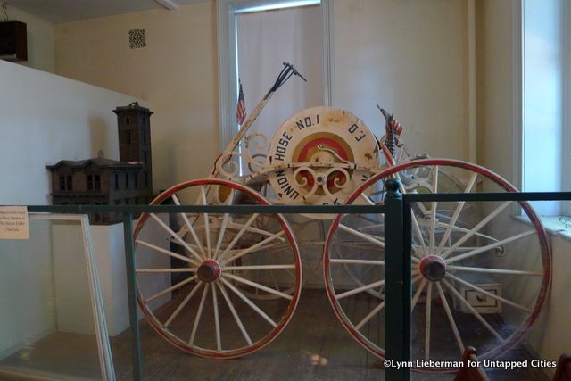 Fire hose pulled by either horse or man