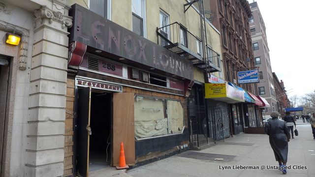 288 Lenox Avenue with its plywood doors and papered windows