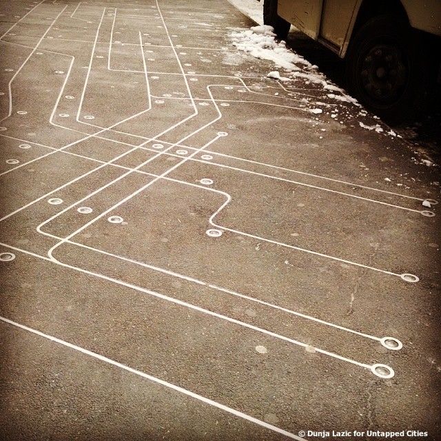 NYC subway map on the sidewalk