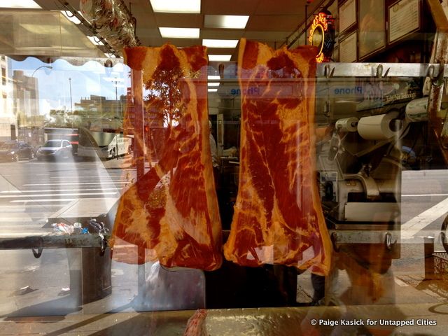 Meat hanging in a butcher shop