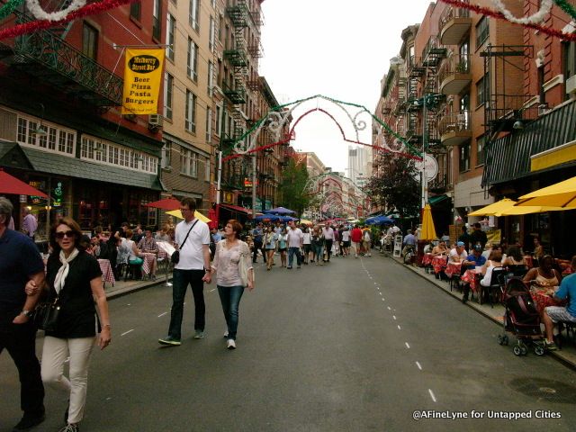 Closed to traffic on weekends, outdoor diners line Mulberry Street