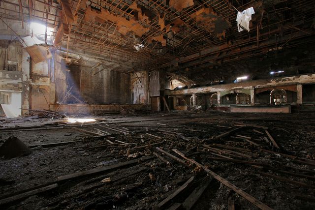 The Ballroom with its flooring in ruins Source: AbandonedNYC