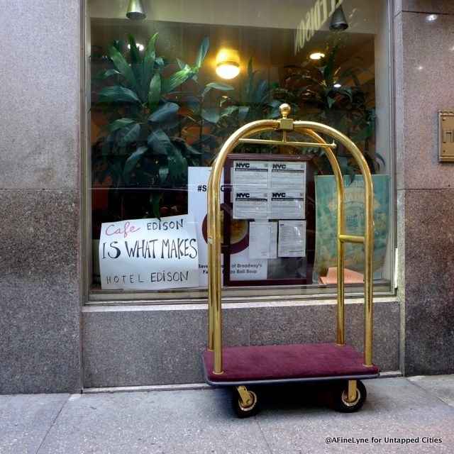 Guests checking in to the Hotel Edison can see posters and signs in all the windows