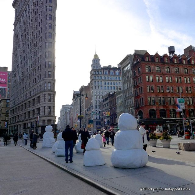 Attracting lots of attention, pedestrians couldn't resist a selfie with a Snow Monster