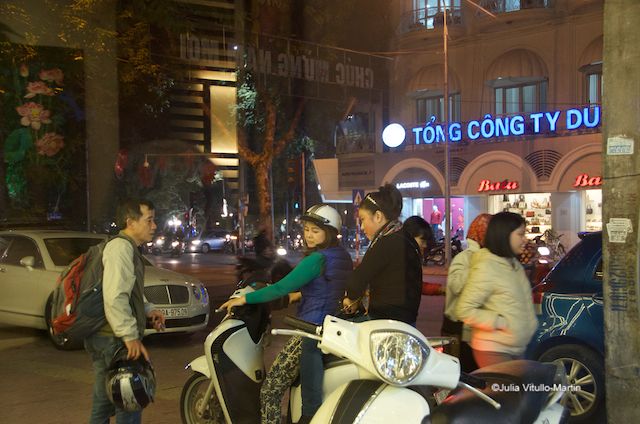 Energetic street scene from inside the Zephyr Hotel at midnight