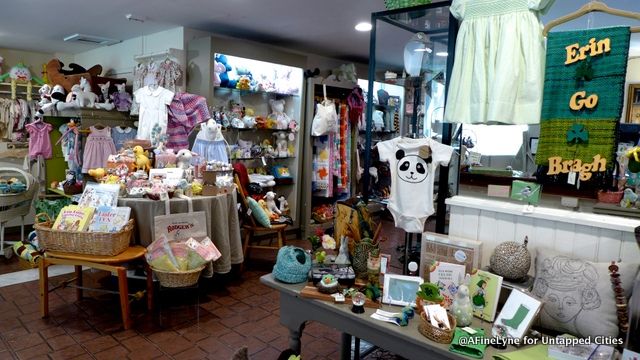 Colorful display tables dot the shop.  This table ready for St. Patrick's Day