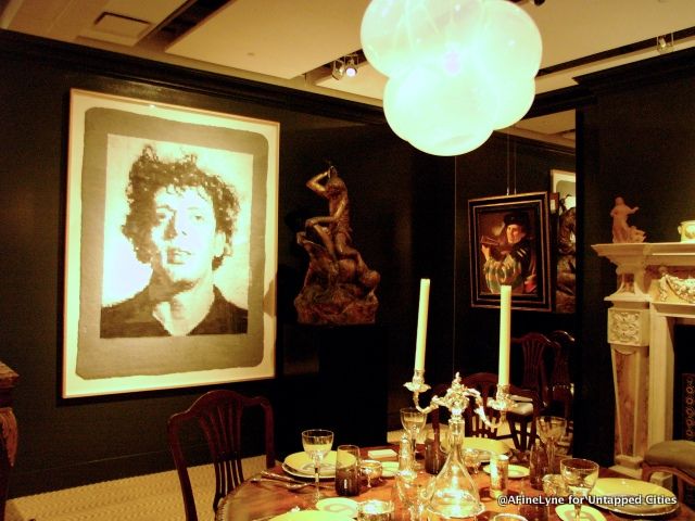 A well-placed Chuck Close in the dining room