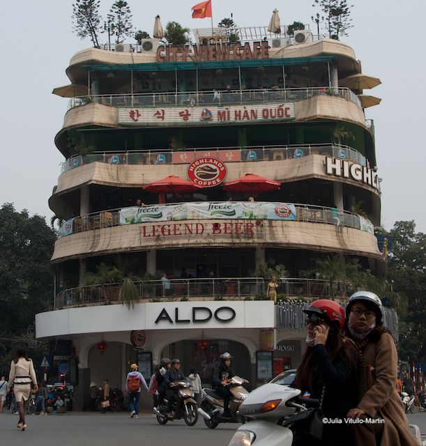 Hanoi pedestrians & motorcyclists in front of City View Cafe