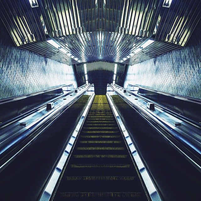 UntappedCities BigScreen Instagram Contest Photo, escalator, NYC, symmetrical beauty, up, down, lights, life, NYC photography