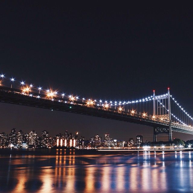 UntappedCities BigScreen Instagram Contest Photo, NYC Bridge, night time, street photography, NYC, lights, moon, water reflection, NYC, night life, city that never sleeps