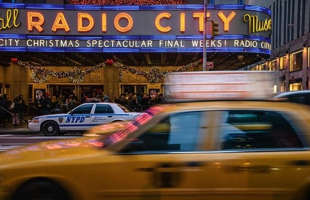 UntappedCities BigScreen Instagram Contest Photo, NYC ,police, taxi , blur , viewpoints, Radio City, Music Hall, NY photogrpahy, beautiful , interesting, streets