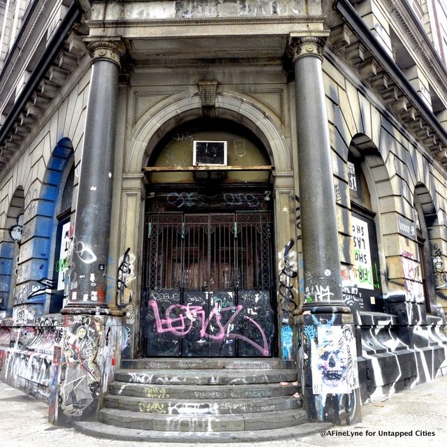 Graffiti covered entrance to 190 Bowery