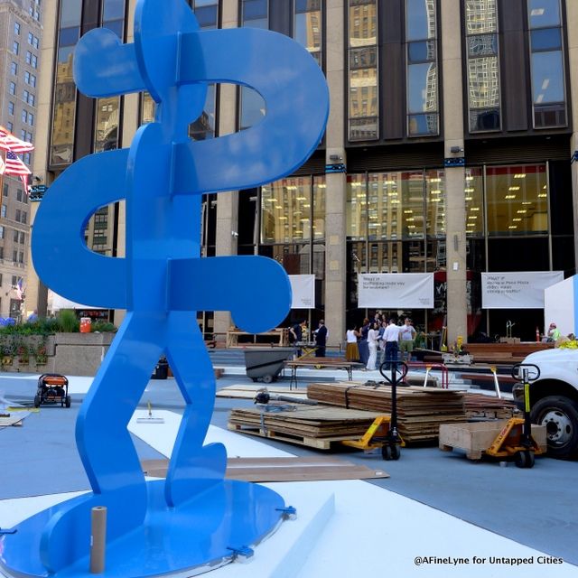 A blue Keith Haring sculpture at 33rd Street