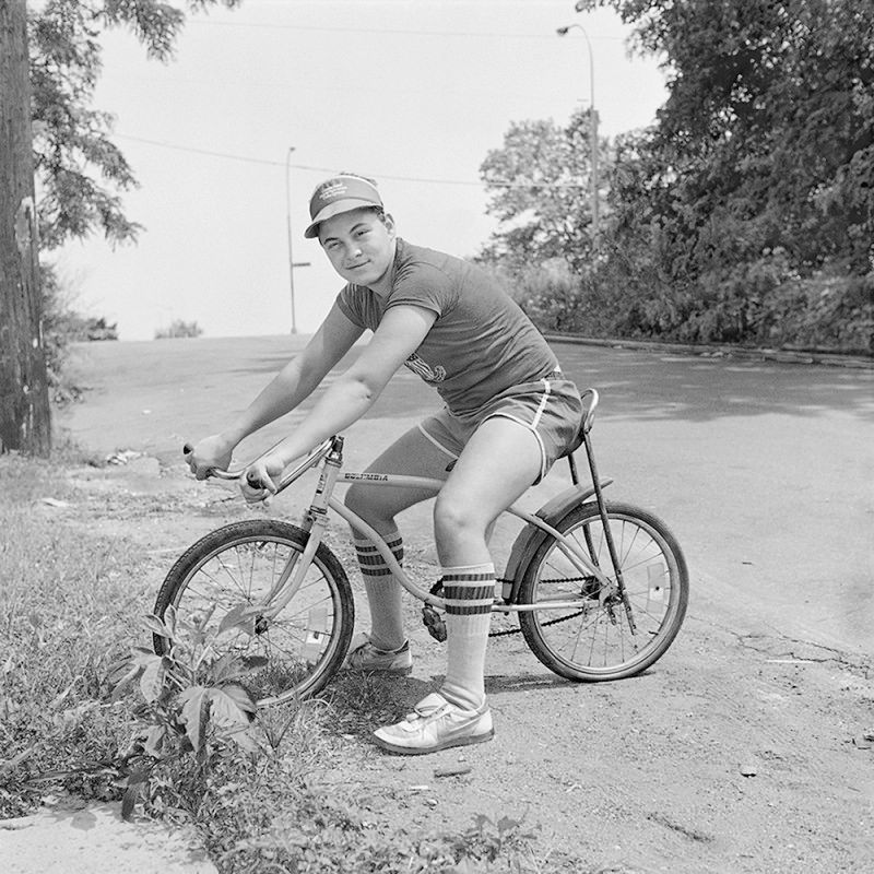 Boy Leaning over Bike-Christine Osinski-Staten Island-NYC-Untapped Cities