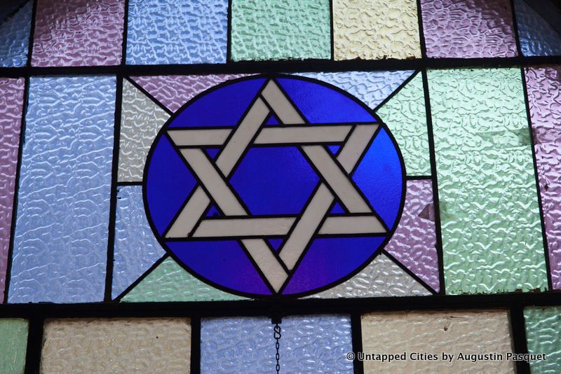 Stained glass window with a Jewish star