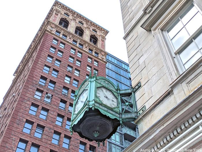 Sun Building clock