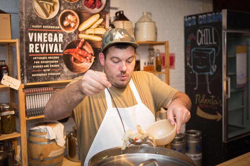 Chef Andrew Gerson pouring up Chankonabe