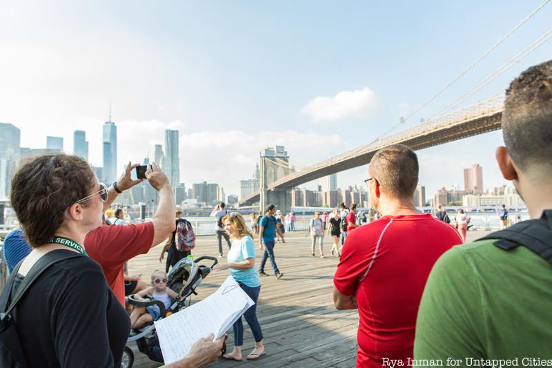 People looking at the Brooklyn Bridge