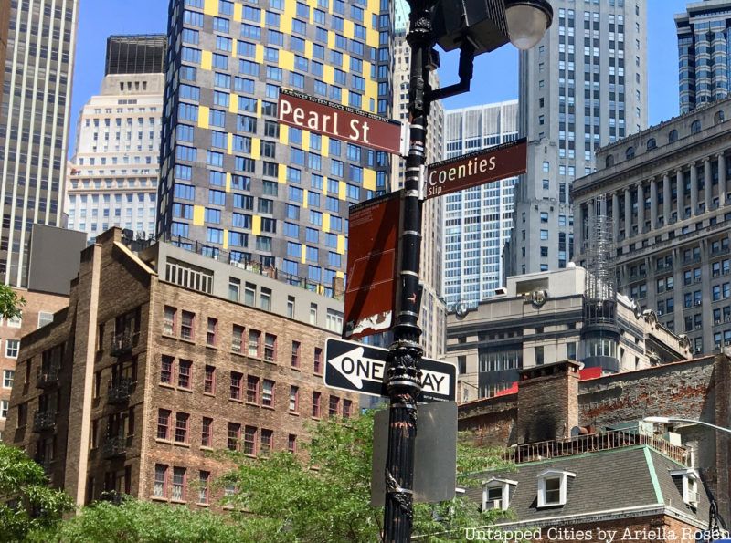 Street signs for Pearl Street and Coenties Slip