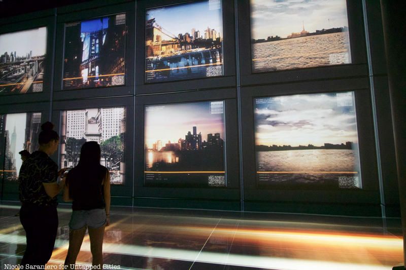 Images of buildings cover the walls of Artechouse in Chelsea Market