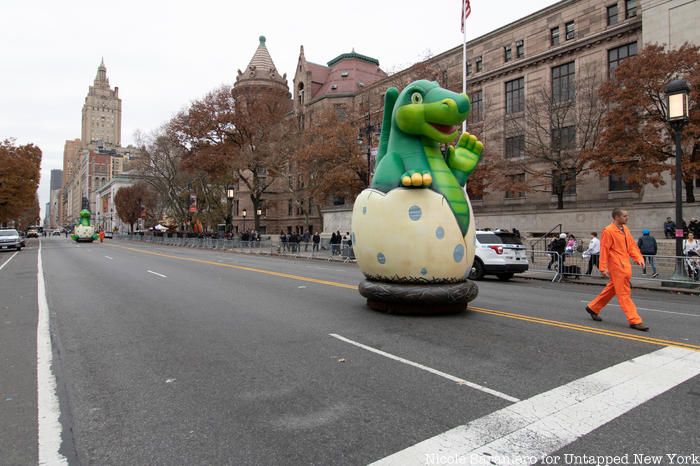 A dinosaur balloon goes on a test run down Central Park West