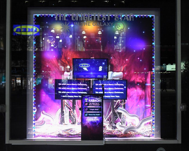 Bloomingdale's holiday windows with Out of This World theme