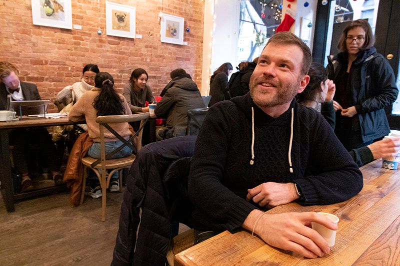 Tour guide Justin Rivers enjoying espresso inside Joe Coffee