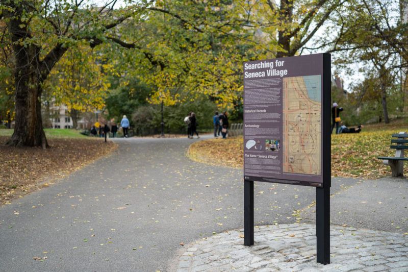 An interpretive sign at the Seneca Village site in Central Park.