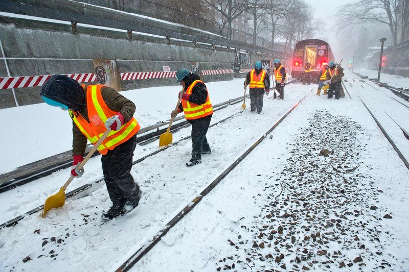 Shoveling on subway tracks