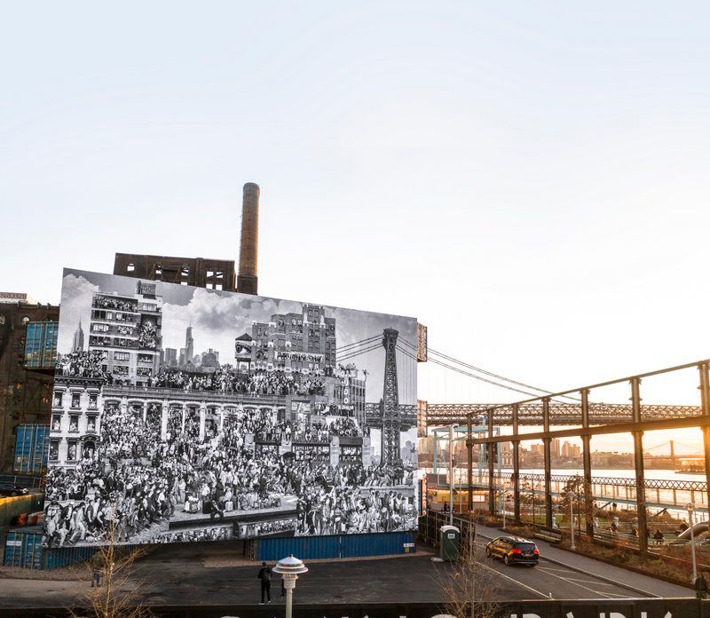 JR's Chronicles of New york mural in Domino Park