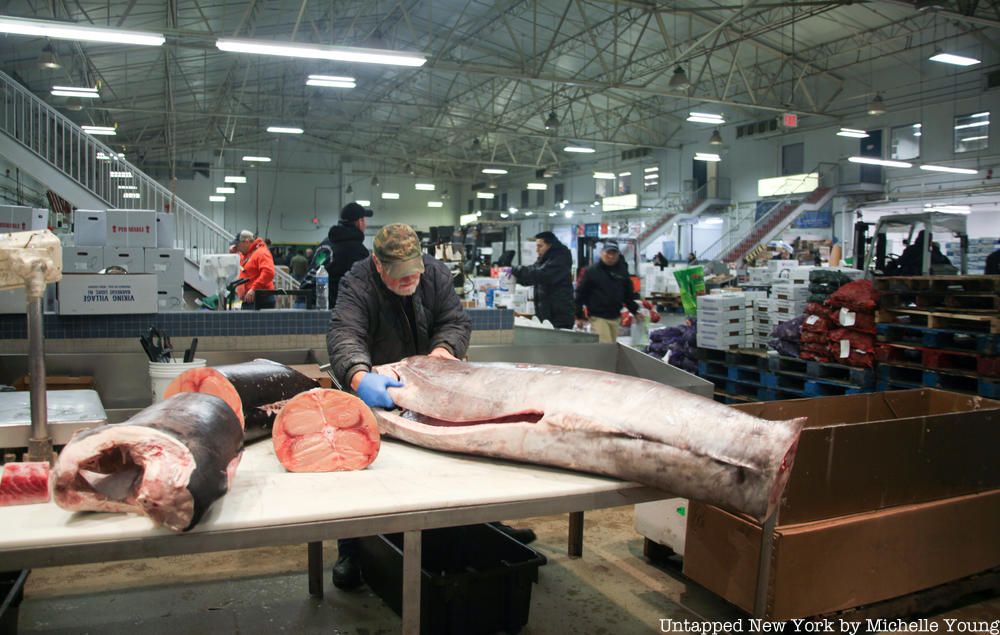 Cutting a swordfish at Fulton Fish Market