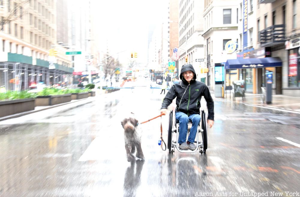 Man in wheelchair with dog