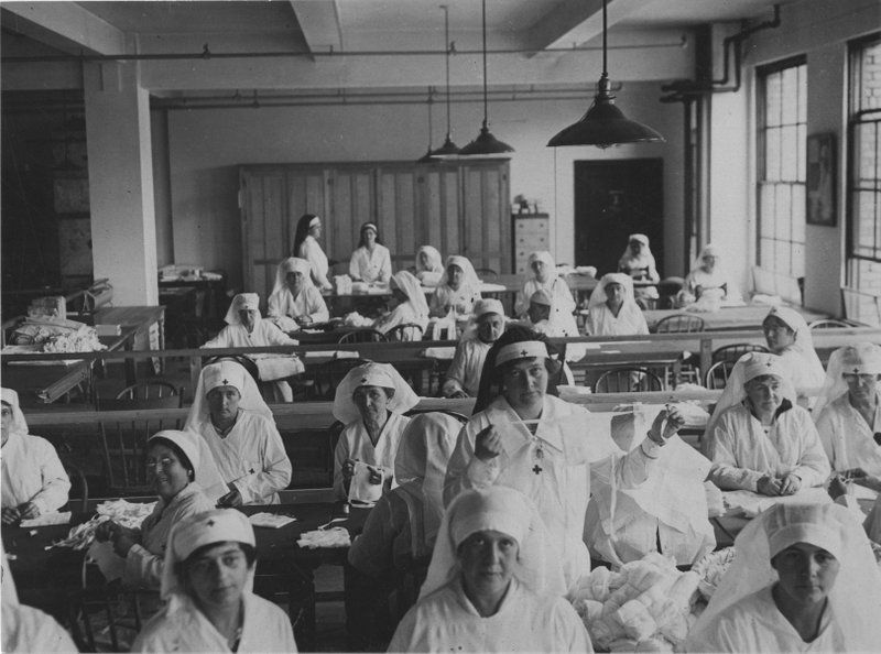 Red cross making gauze masks