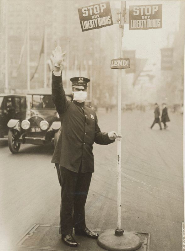 Traffic Cop wearing flu mask