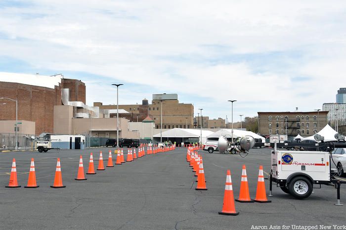 Orange construction cones lined up at Coronavirus drive-thru testing site in Flatbush