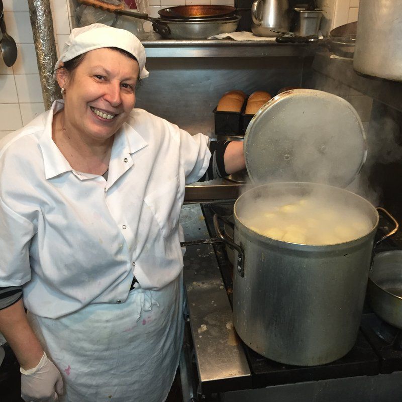 Bogusia and a pot of matzo balls. Credit: Photo by Andy Reynolds.