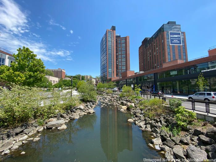 Saw Mill River with condos in background