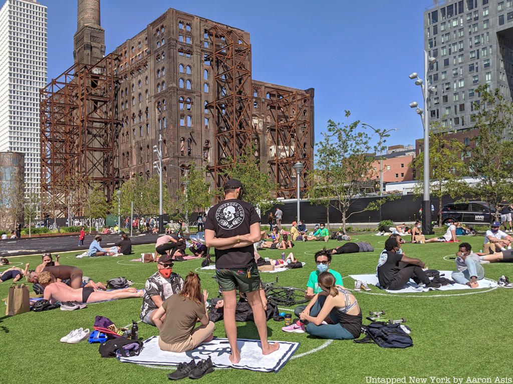 People using Social distancing circles at Domino Park